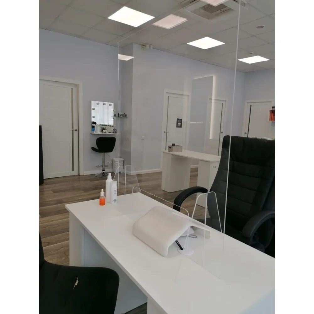 Protective shield for a manicure table